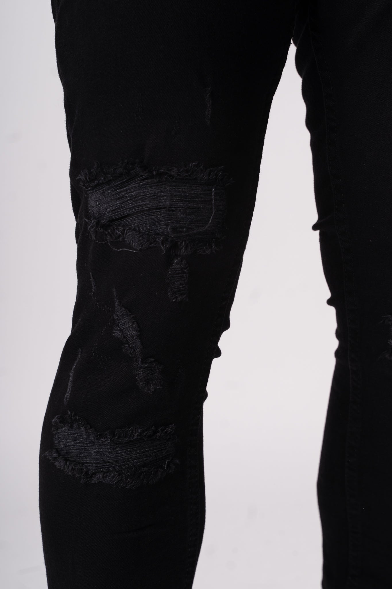 Czarne spodnie z łańcuszkiem "MenIsland"